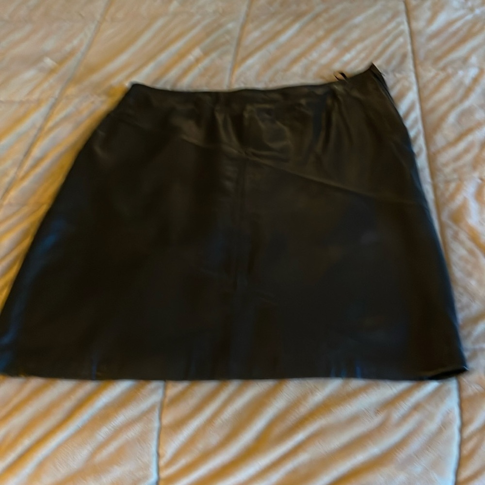 Black leather full cut skirt. VG condition